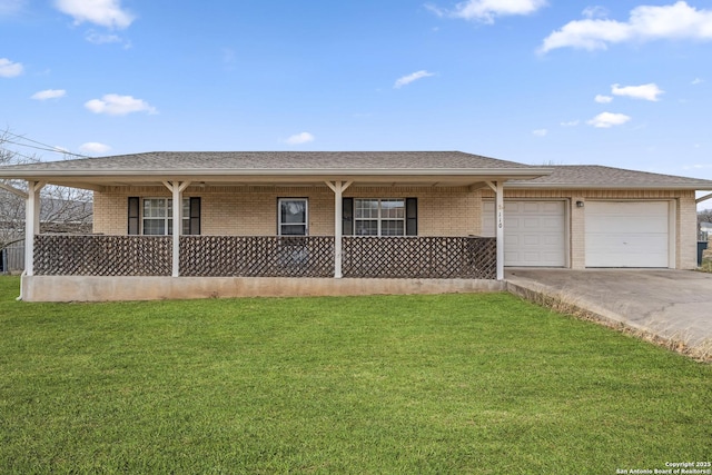 ranch-style home with a front lawn and a garage