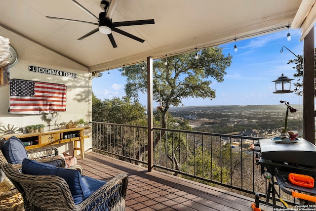 balcony with ceiling fan and area for grilling