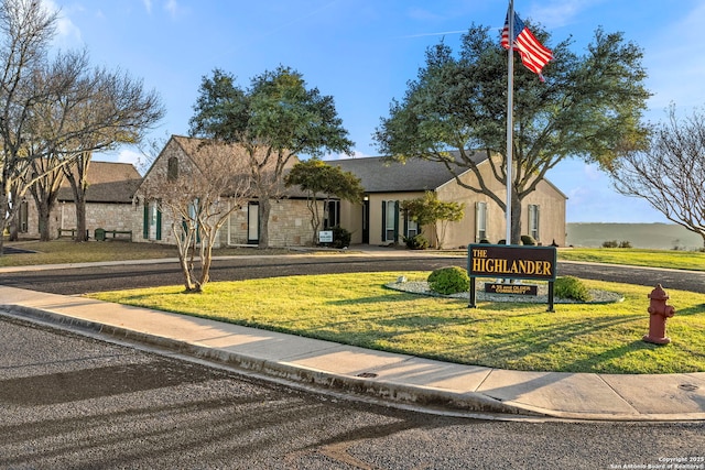 view of front of property with a front lawn