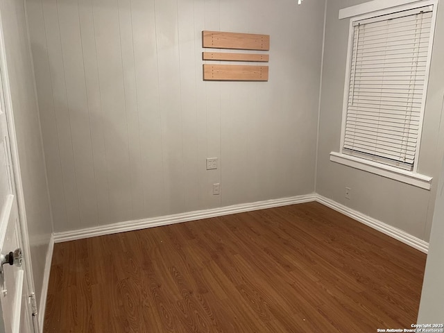 spare room featuring hardwood / wood-style floors