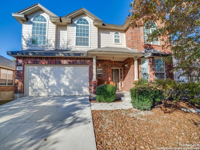 view of front of property with a garage