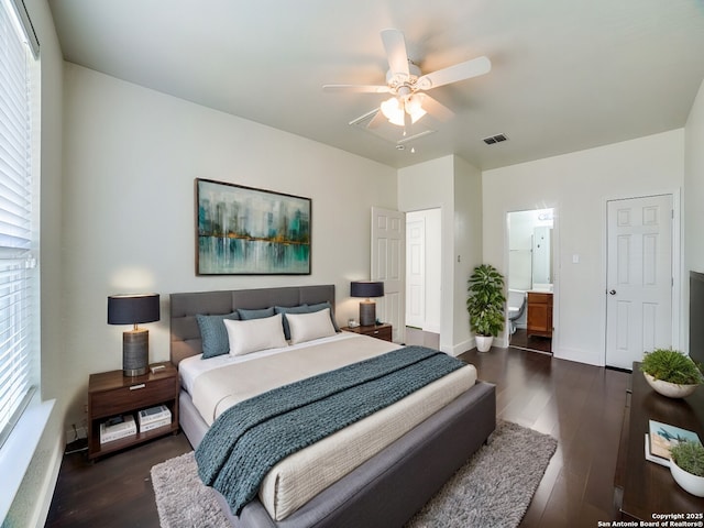 bedroom with ensuite bathroom, ceiling fan, and dark hardwood / wood-style floors