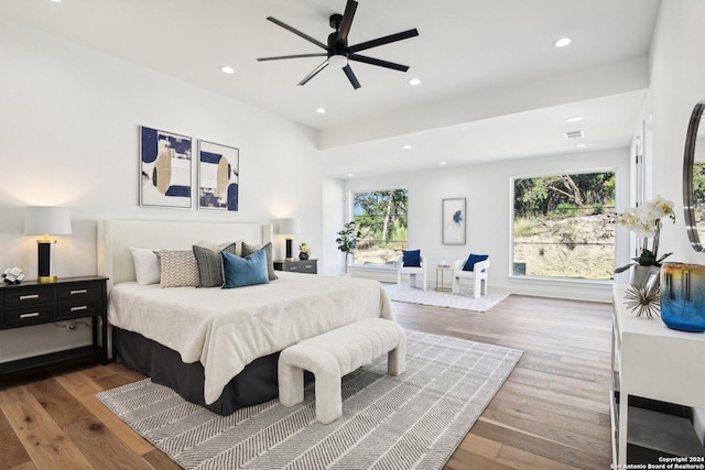 bedroom with hardwood / wood-style floors and ceiling fan