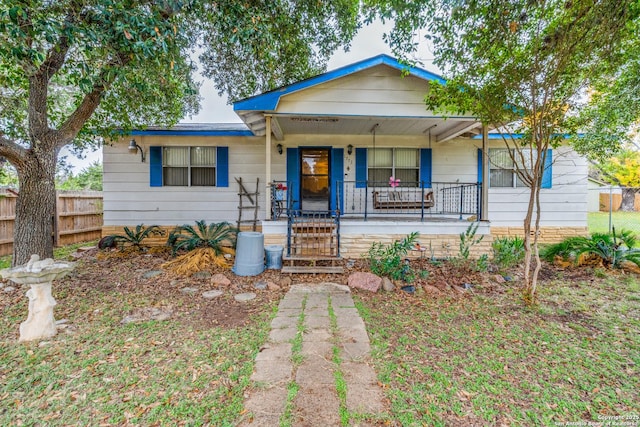 bungalow-style home featuring covered porch