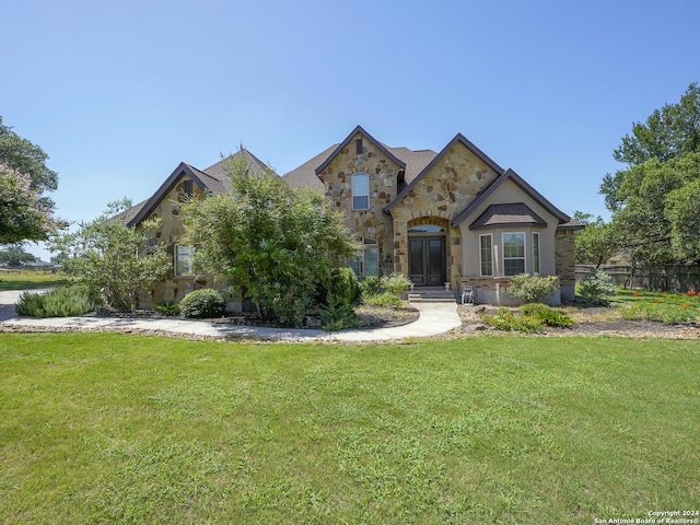 view of front of house with a front lawn