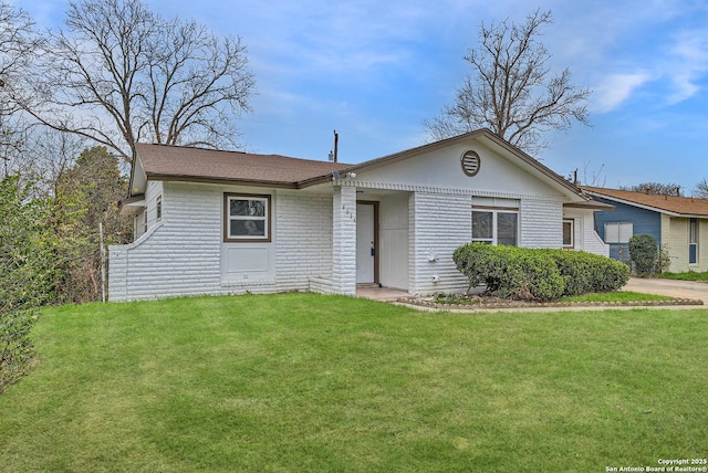 view of front of home with a front yard