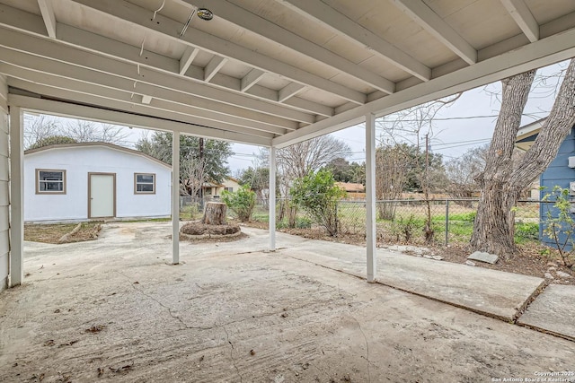 view of patio / terrace featuring an outbuilding