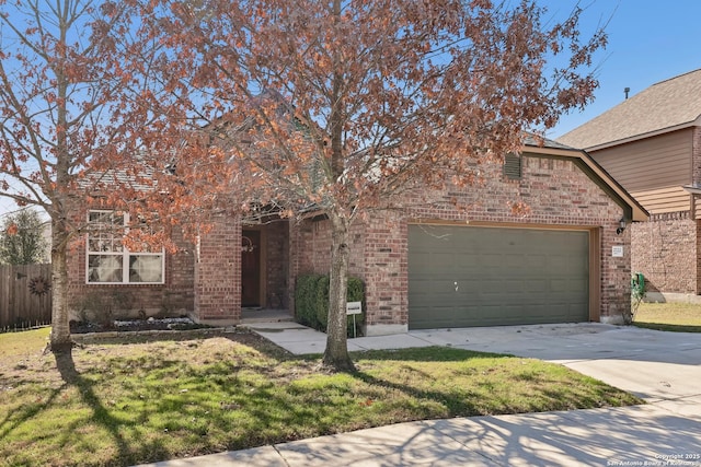 view of front of home with a garage and a front yard