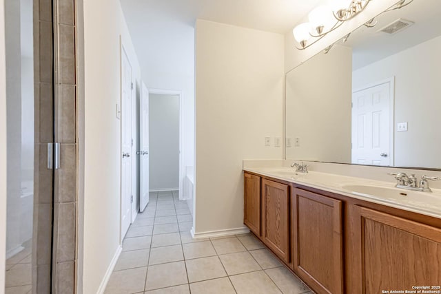 bathroom featuring tile patterned floors and vanity