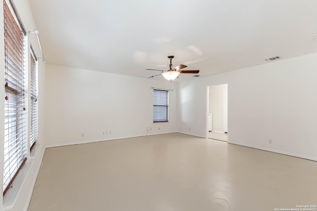 spare room with ceiling fan