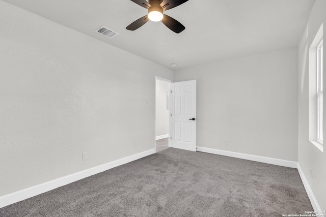 unfurnished room featuring carpet flooring and ceiling fan