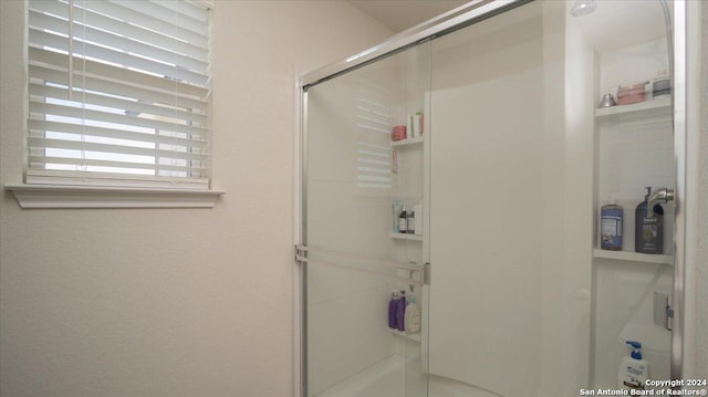 bathroom with walk in shower