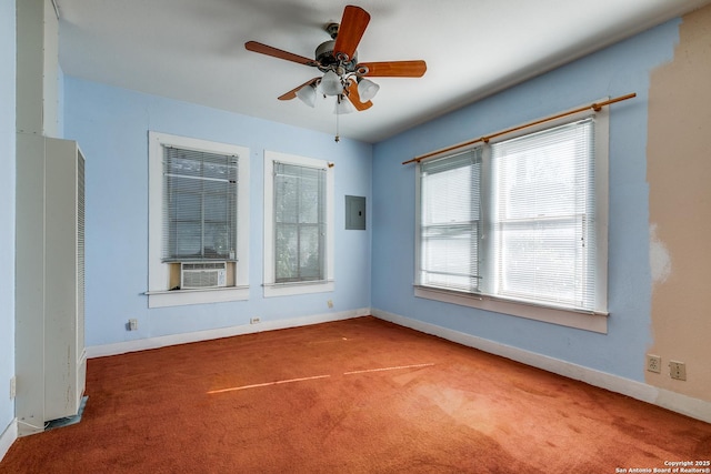 spare room with cooling unit, electric panel, ceiling fan, and carpet floors