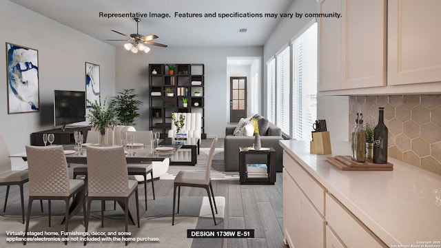 dining area with ceiling fan