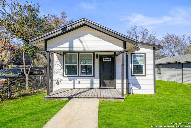 bungalow with a front lawn