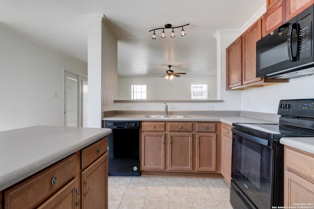 kitchen featuring black appliances, ceiling fan, crown molding, light tile patterned flooring, and sink