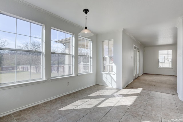 unfurnished dining area featuring light carpet