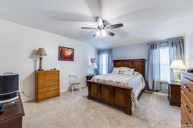 bedroom featuring ceiling fan and light carpet