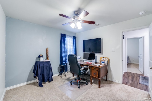 office space with carpet flooring and ceiling fan