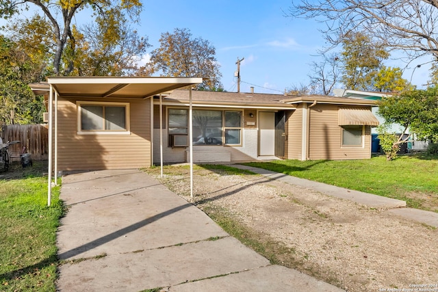 view of front of property with a front lawn