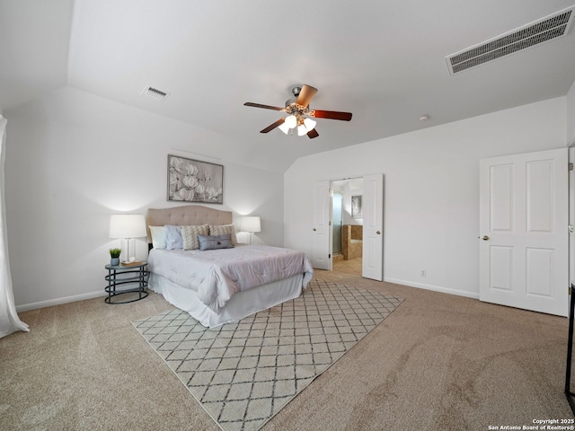 bedroom featuring light carpet, baseboards, visible vents, and vaulted ceiling