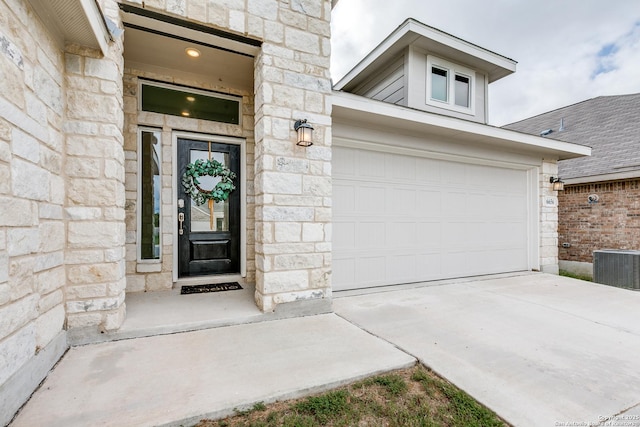 doorway to property with central AC unit