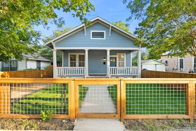 bungalow featuring covered porch