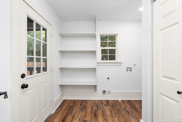 laundry area with electric dryer hookup, dark hardwood / wood-style flooring, and hookup for a washing machine