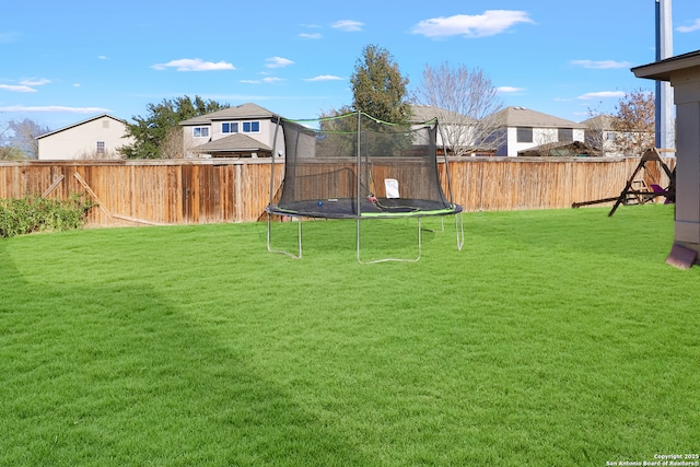 view of yard featuring a trampoline