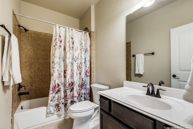 full bathroom with tile patterned floors, shower / bath combination with curtain, toilet, and vanity