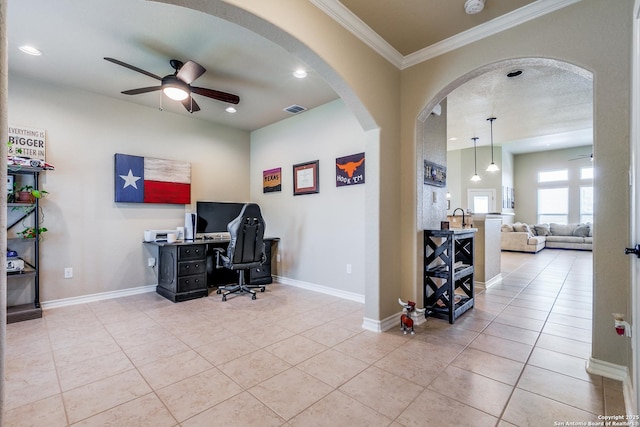 tiled office with ceiling fan, ornamental molding, and sink