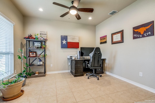 office area with ceiling fan and light tile patterned floors