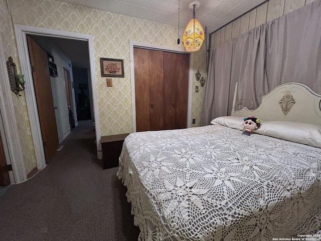 carpeted bedroom with a closet