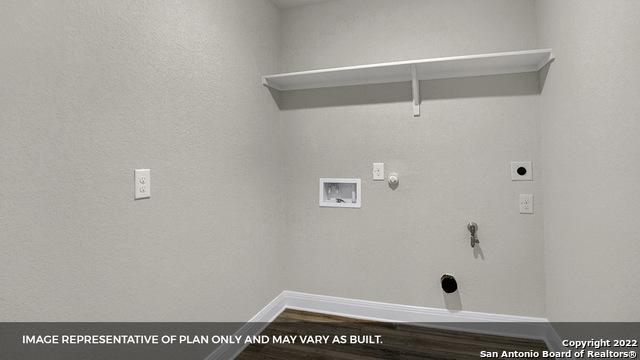21070 Watercourse Way, San Antonio, TX 78266 - laundry area featuring hookup for an electric dryer, washer hookup, gas dryer hookup, and hardwood / wood-style floors