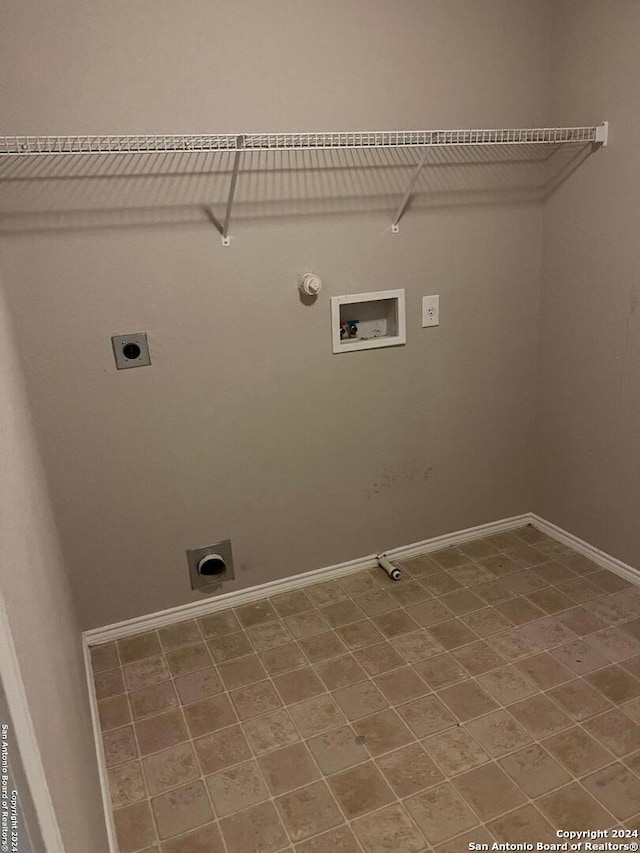 washroom with hookup for an electric dryer, hookup for a washing machine, and gas dryer hookup