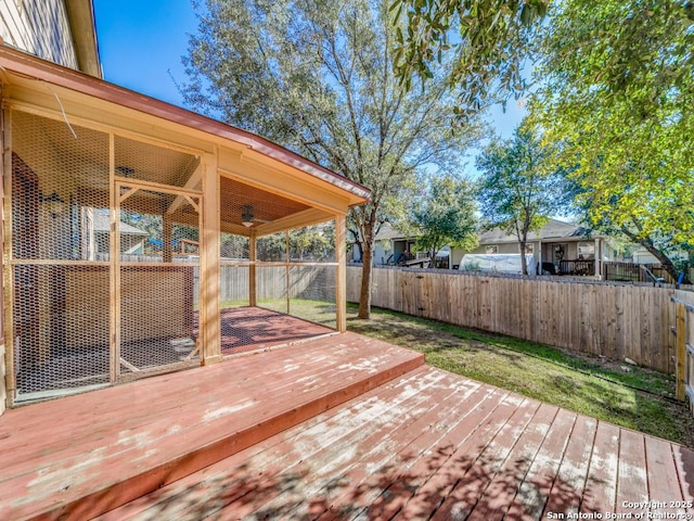 wooden deck with ceiling fan