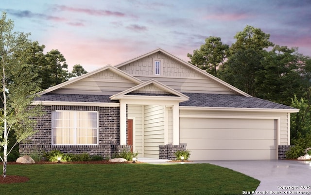 view of front of home with brick siding, a shingled roof, concrete driveway, a lawn, and a garage