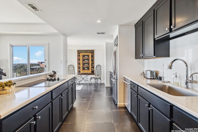 kitchen featuring appliances with stainless steel finishes and sink