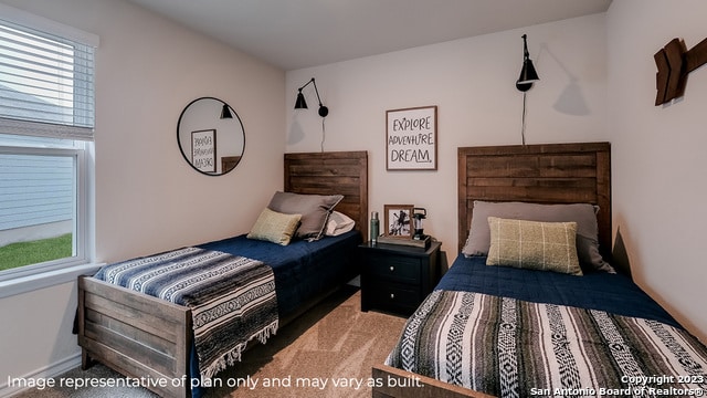 bedroom with multiple windows and light carpet