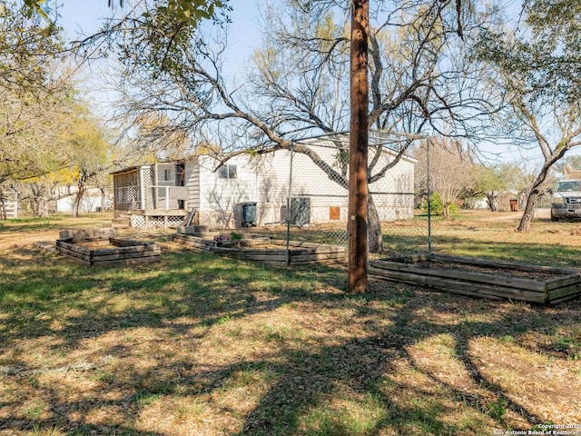 view of yard with a deck