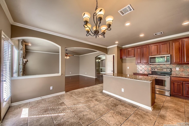 kitchen featuring backsplash, ceiling fan with notable chandelier, crown molding, light stone countertops, and stainless steel appliances