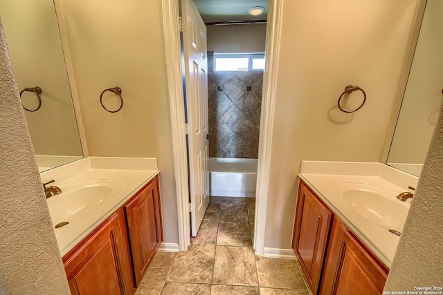 bathroom featuring a bathing tub and vanity