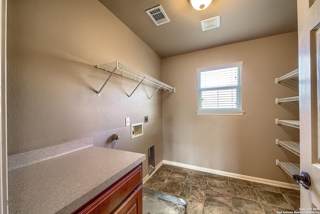 laundry room featuring hookup for a washing machine and hookup for an electric dryer