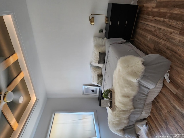 bedroom with wooden walls