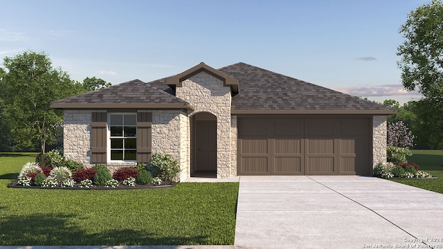 view of front of property with a garage and a front lawn