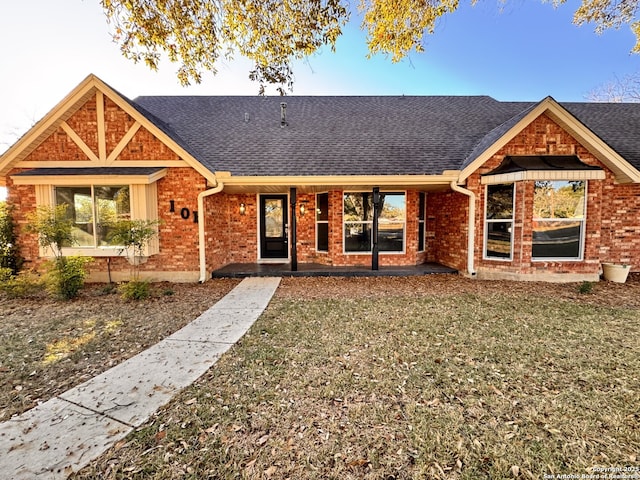 exterior space featuring a front lawn