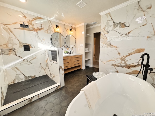 bathroom with vanity, plus walk in shower, crown molding, tile patterned flooring, and a textured ceiling