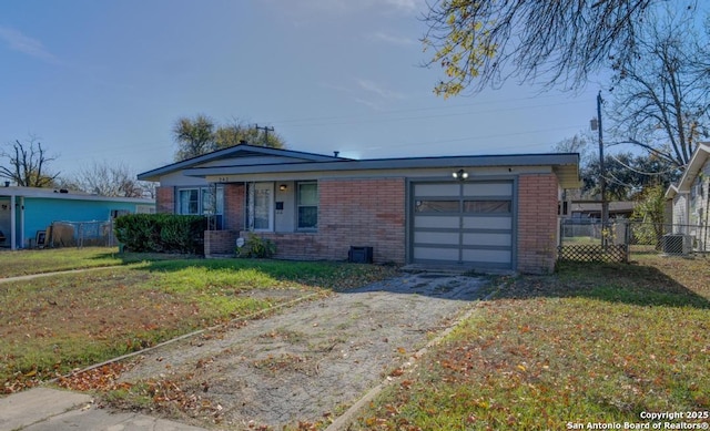 ranch-style home with a front lawn