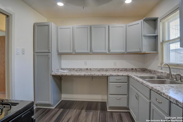 kitchen featuring gray cabinets, sink, and dark hardwood / wood-style floors