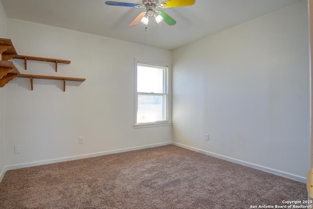 carpeted empty room featuring ceiling fan